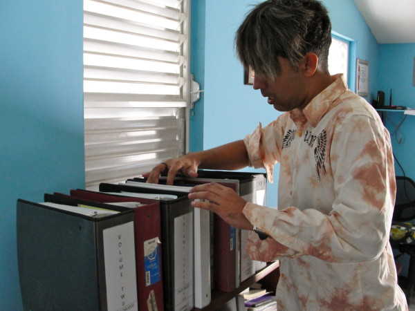 Caleb Orozco in his office. Photo credit Julia Scott